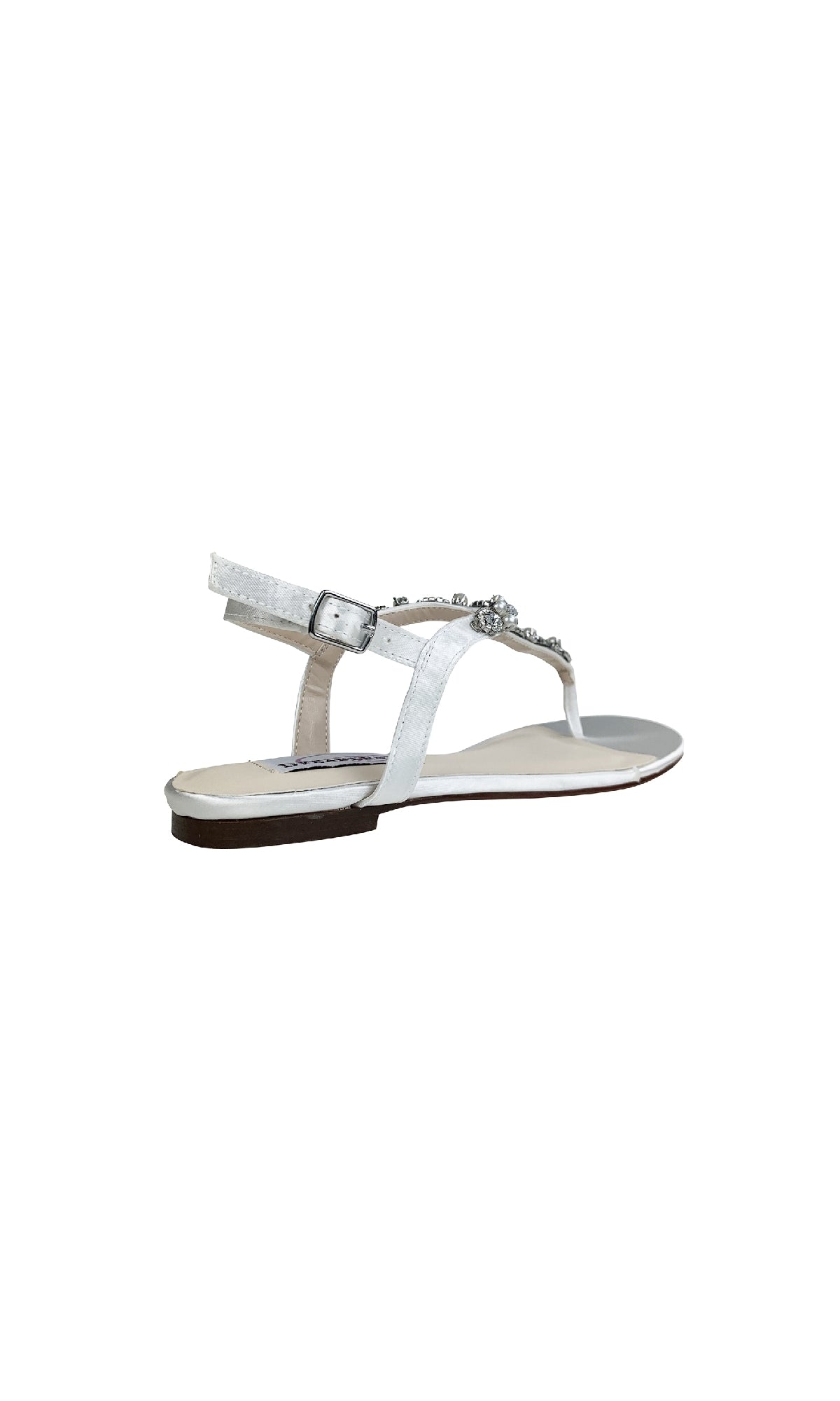The Stella White Satin Flat Sandal Prom Shoes (Dyeables 4377) feature a flat sole, ankle strap with buckle, and decorative embellished straps. Shown from a rear side angle—ideal for an elegant prom look.